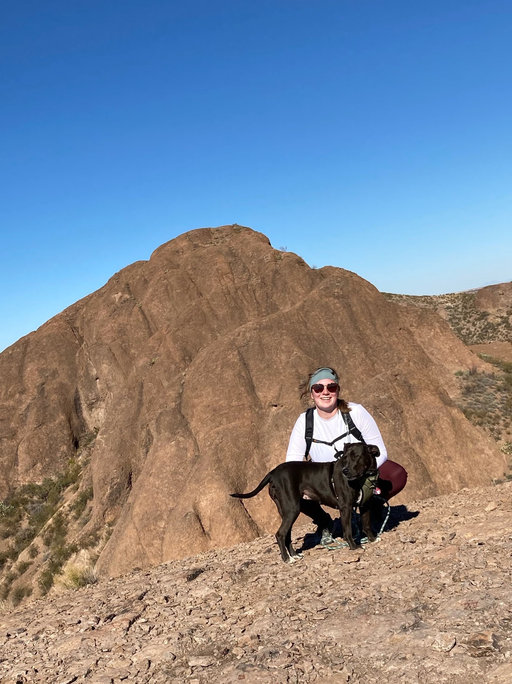 Emma Prager and dog on a hike